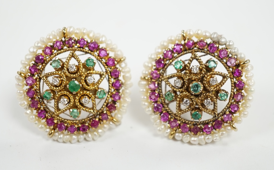 A pair of 20th century Indian yellow metal and multi gem set disc shaped earrings, 22mm. Condition - fair